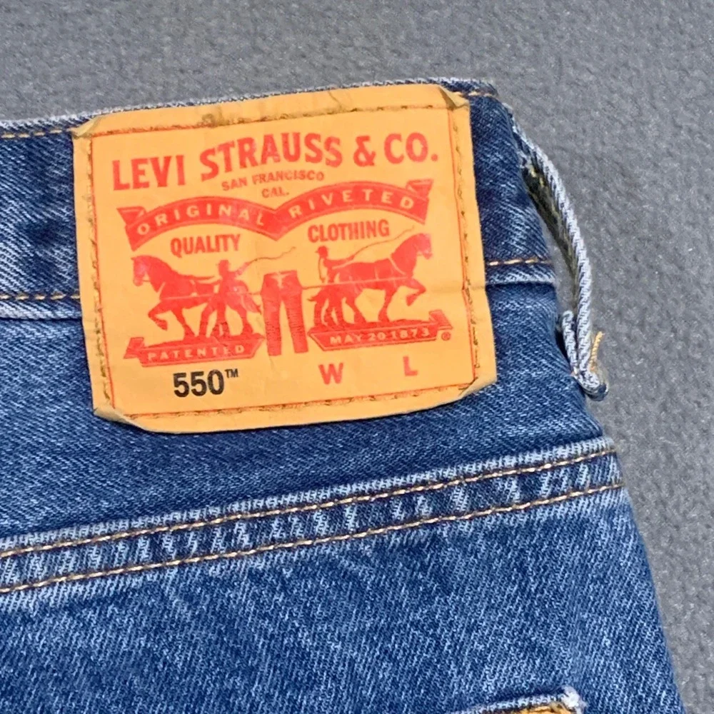 Levi's 550 Relaxed Fit Jeans Mens 46x30 Blue Tapered Leg Medium Wash Denim